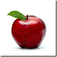 ripe red apple with green leaf isolated on white