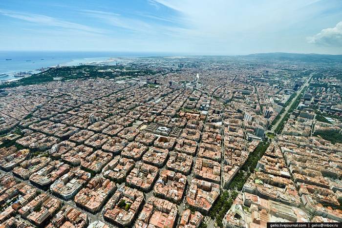 Eixample is a district of the Spanish city of Barcelona, that lies between the old city and the surrounding small towns. The district was built as an extension (hence the name “Eixample”) when Barcelona started to grow during the middle of the 19th century. The 7.5 square km district is characterized by long straight streets, a strict grid pattern crossed by wide avenues, and octagonal city blocks - rectangular blocks with the corners cut off, which are distinctive for Barcelona. This was the visionary, pioneering design by Spanish urban planner Ildefons Cerdà, who considered traffic and transport along with sunlight and ventilation in coming up with his characteristic octagonal blocks.