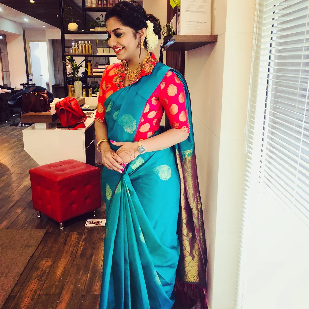 Actress Meera Nandan Looking pretty In Blue saree Stills
