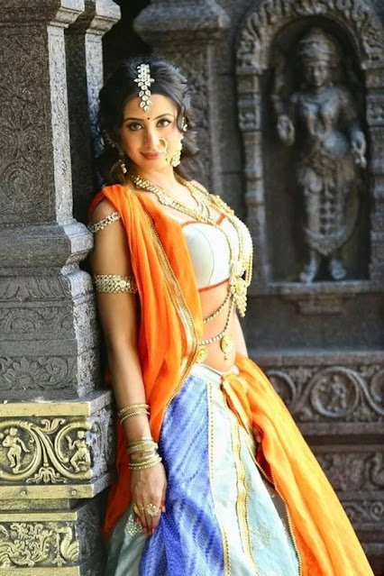 Sanjjanaa Galrani posing in a glamorous outfit