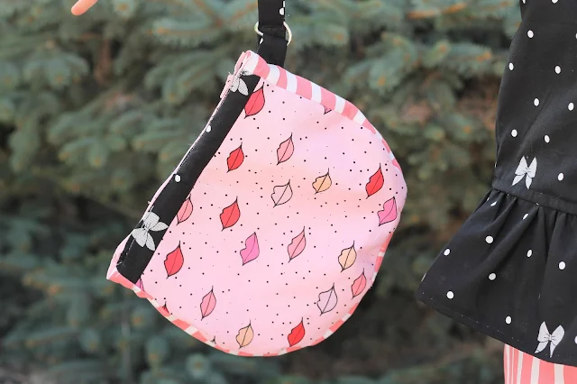 Make this simple purse with this free little girl purse pattern and tutorial.  Create a one of a kind gift using the Kiss Me Kate fabric from Riley Blake.