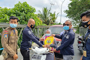 Tim Beruang Polres Muratara Bagikan Masker dan Sembako