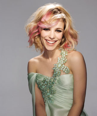 She had light blonde hair with light blonde hair with highlights. She had light blonde hair with
