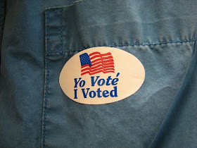 A bilingual 'I voted' sticker from the US