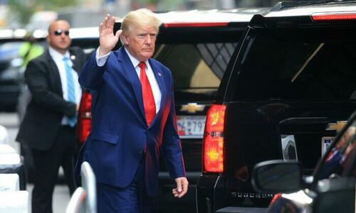 Former President Donald Trump waves while walking to a vehicle outside of Trump Tower in New York on Aug. 10, 2022. (Stringer/AFP via Getty Images)