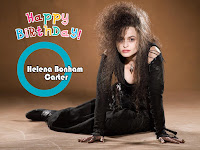 helena bonham carter, her mysterious hairstyle in hot black dress sitting on floor