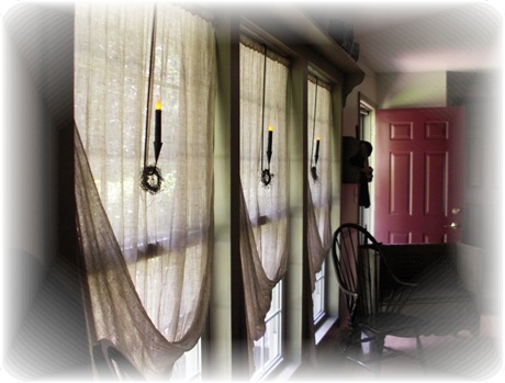 Sconces on front windows