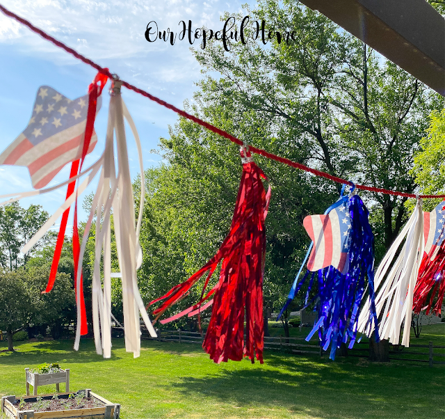 red white blue tassels hanging swaying in breeze