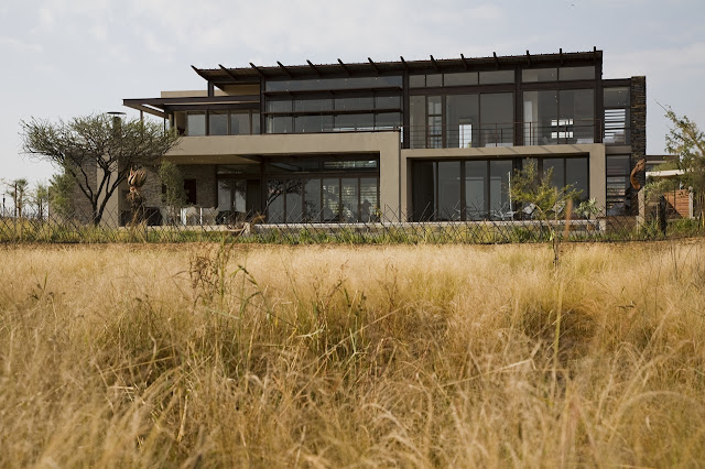 Modern Serengeti House by Nico van der Meulen Architects as seen from the field 