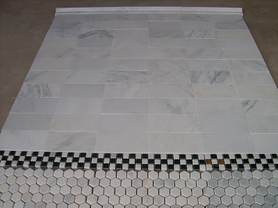 Carrara Marble must bring out everyones creative side the warehouse guys, 