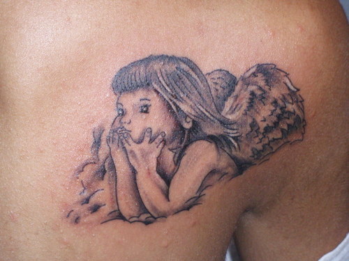angel and cherub tattoos. Angel and cherubs are known as