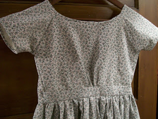 Close up of smooth infant bodice on girl's dress.