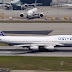 United Airlines Boeing 747-400 Taxiing At Hong Kong Airport