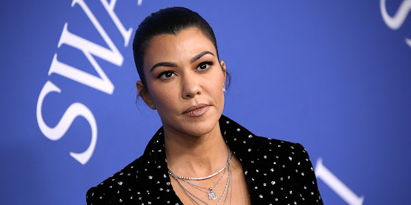 Kourtney Kardashian hits again at fan asking about her being pregnant