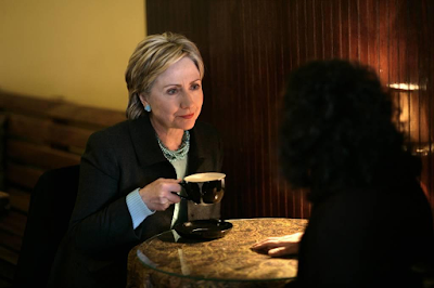 photo of Hillary Clinton with cup of coffer during the 2008 Presidential Campaign, New Hampshire by Brooks Kraft