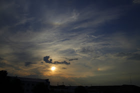 small rainbow near the sun