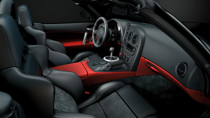 The 2008 Dodge Viper SRT10 cockpit retains its characteristic red