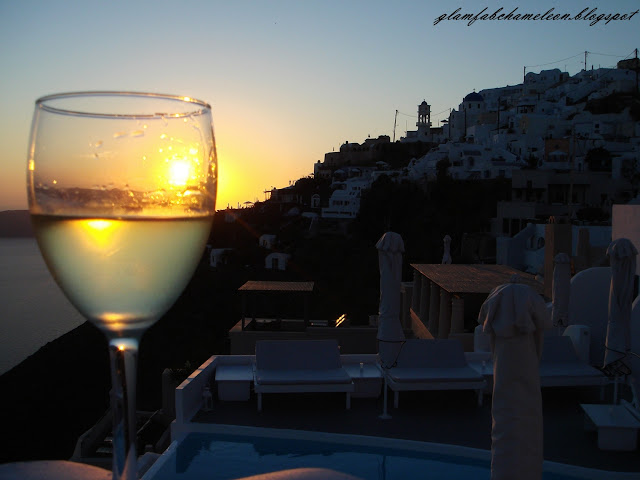 drinking white wine in Santorini