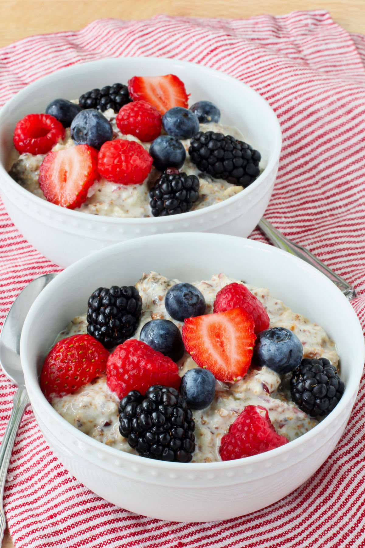 Muesli in bowls with berries.