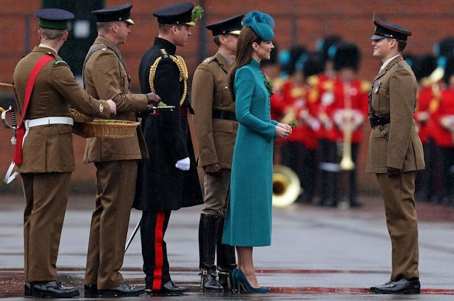 Princess of Wales wore a sea-green coat dress by Catherine Walker. Gold shamrock brooch. Emmy London stiletto heels