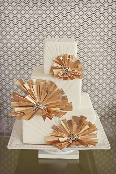 An amazing white and gold Art Deco cake by Bliss Wedding and Event Design