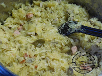 bigos z kiszonej kapusty na żeberkach z kiszonej kapusty i słodkiej z kiszonej kapusty kuroń bigos polski przepis bigos z kiszonej kapusty pieczony staropolski z kiszonej kapusty magdy gessler catering Pszczyna dartpol kucharz szef kuchni 