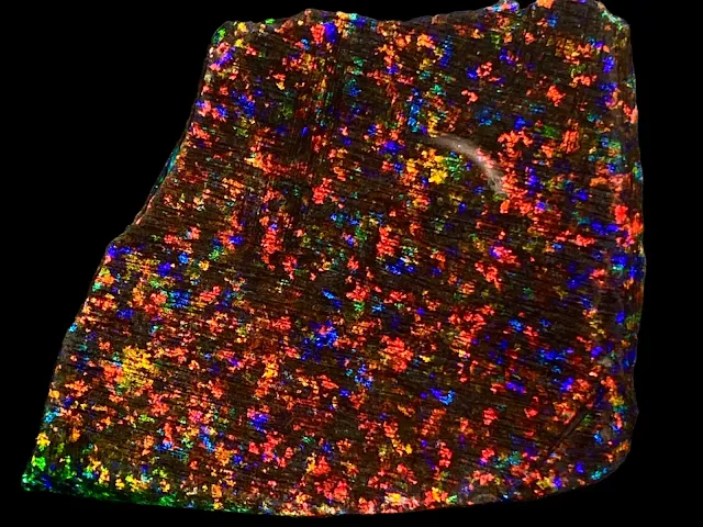 Polished Andamooka matrix opal