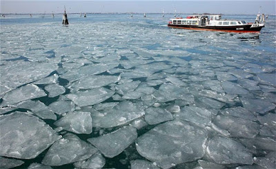 vaporetto ferries passengers across the frozen Venice lagoon