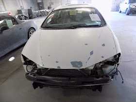 "Trim Removal" refers to taking off all the parts that are not supposed to have paint on them.