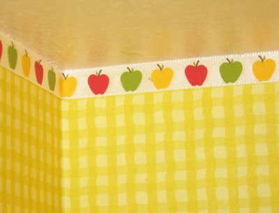  I just did with an apple border and yellow scrapbooking paper wallpaper.