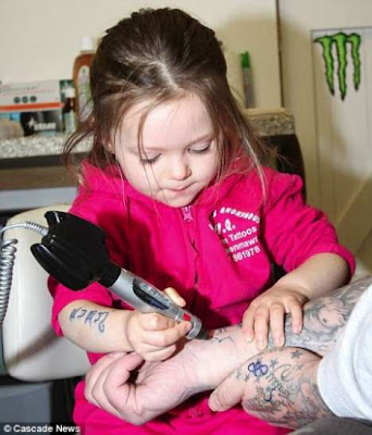 Toddler tattoo artist