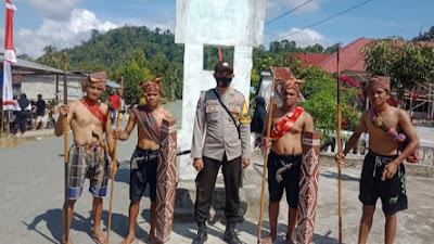 Bhabinkamtibmas Polsek Palolo Amankan Kegiatan Lomba Sumpit Di Desa Rejeki