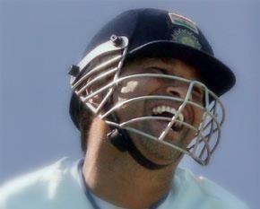 Sachin Tendulkar laughing while playing cricket