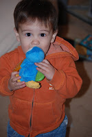 Tyler playing with the duckie