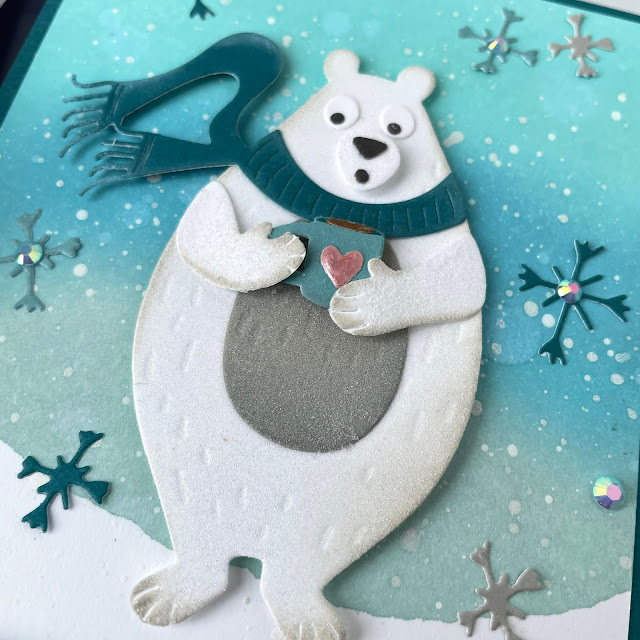 Polar Bear Christmas card made with: Tim Holtz distress oxide inks, cosy winter Sizzix die, frosted crystal embossing powder; Scrapbook.com A2 smooth cardstock, mint tape, frost metallic ink, Pops of Color rose gold; Pinkfresh jewels