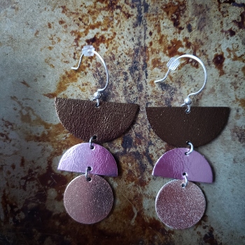 Geometric leather and sterling silver dangling earrings in metallic colors