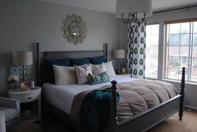 master bedroom, bedroom, bedding, how to make a bed, teal, teal bedding, white bedding, sunburst mirror, mirror over bed