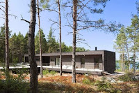 Summer Vacation Villa Design with Shaped Gray Concpet on Edge of Lake