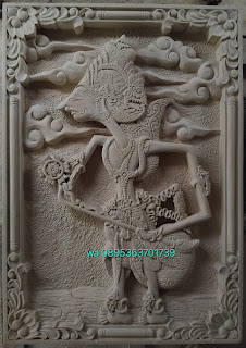 Ukiran batu alam paras jogja motif relief wayang krena
