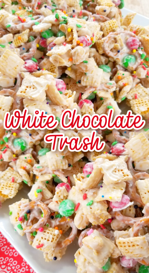 White Chocolate Trash! Also called Christmas Crack, this sweet and salty snack mix made with chex cereal, pretzels, peanuts, M&M’s and white chocolate is the perfect treat!