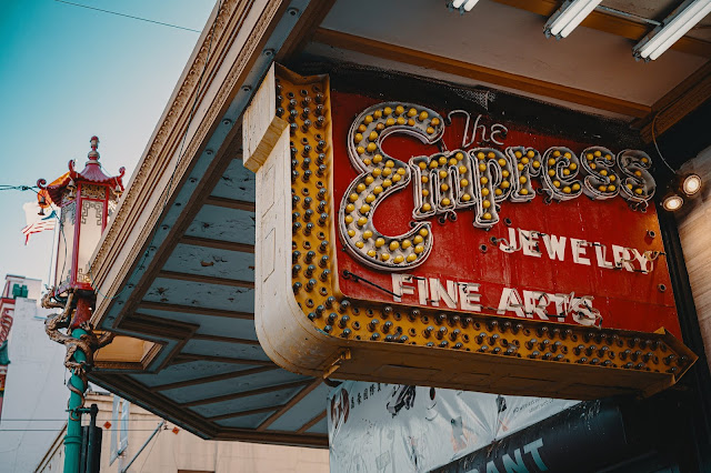 A vintage signage for a jewelry antique store.