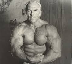 Superstar Billy Graham flexing like there's no tomorrow.