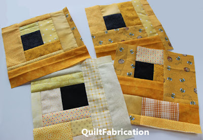 yellow quilt blocks with an offset black square