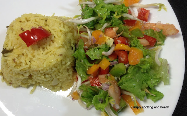 Rice with pigeon pea in coconut milk and bell pepper (capsicum) salad