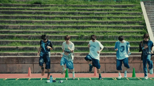 Dunk Shot - NCT Wish Gif from the music video of kpop boy group NCT Wish song Dunk Shot. In the gif, Yushi trains the other members.