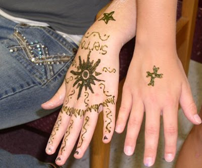 Beautiful Women with Nice Henna tattoo in hand
