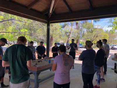 Hotshot crew participating in sandtable exercise