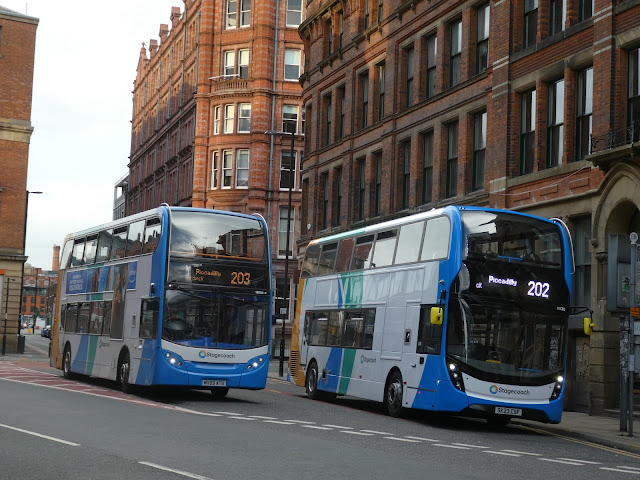 11730 SK23 CSF seen alongside 19504 MX09 ATU in Manchester City Centre on layover.