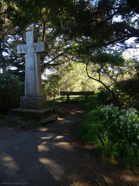 26: stone cross and bench