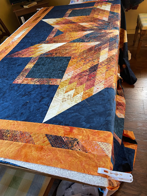 lone star quilt being basted